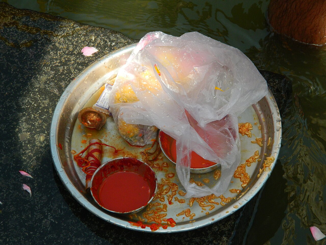 Real pooja thali with flowers and offerings